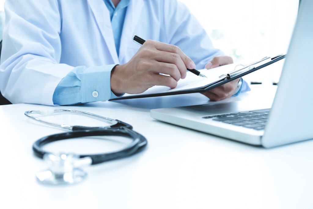 Doctor managing regulatory compliance in healthcare
Clinical practice and healthcare compliance documentation